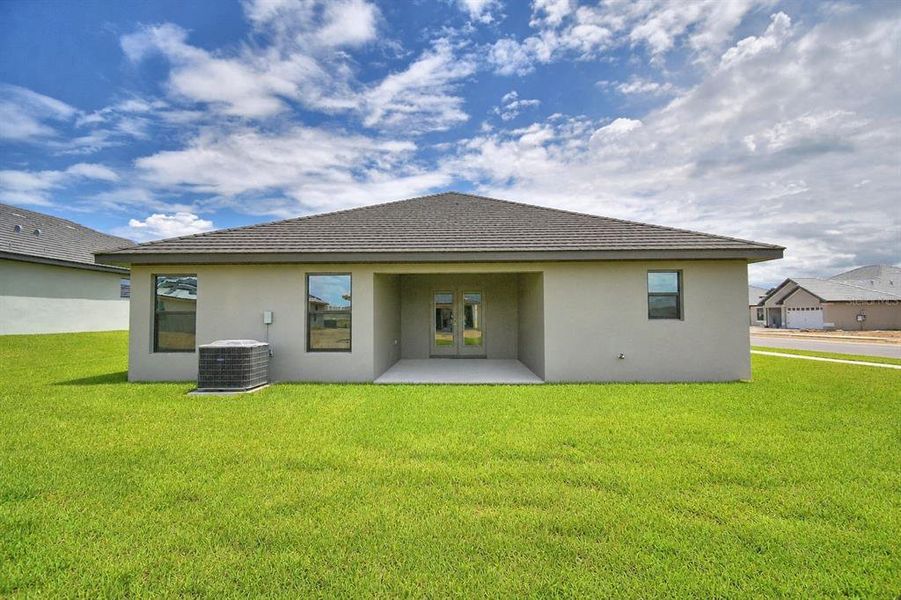 Exterior details and patio area of a home in Cadence Crossing, Auburndale (Image 2). Exterior details and patio area of a home in Cadence Crossing, Auburndale (Image 2).