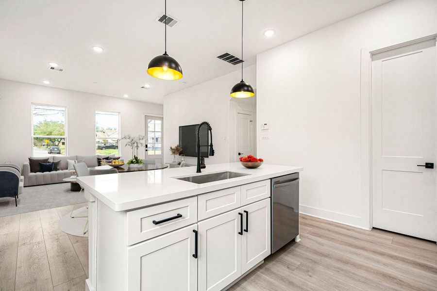 The seamless flow into the living area, complemented by large windows that flood the space with natural light, creates the perfect setting for entertaining and everyday living. The seamless flow into the living area, complemented by large windows that flood the space with natural light, creates the perfect setting for entertaining and everyday living.