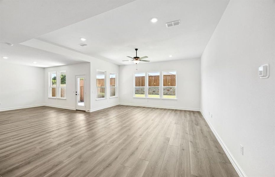 Sunlit gathering room designed for relaxation and entertainment Sunlit gathering room designed for relaxation and entertainment