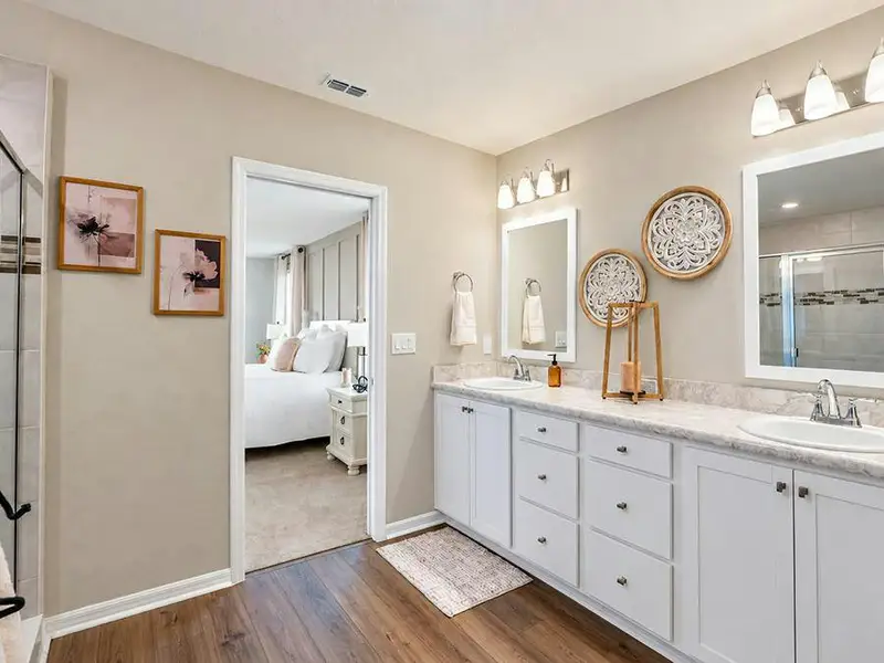 The in-law suite includes a spacious en-suite bath and a walk-in wardrobe - Wayfair III by Highland Homes