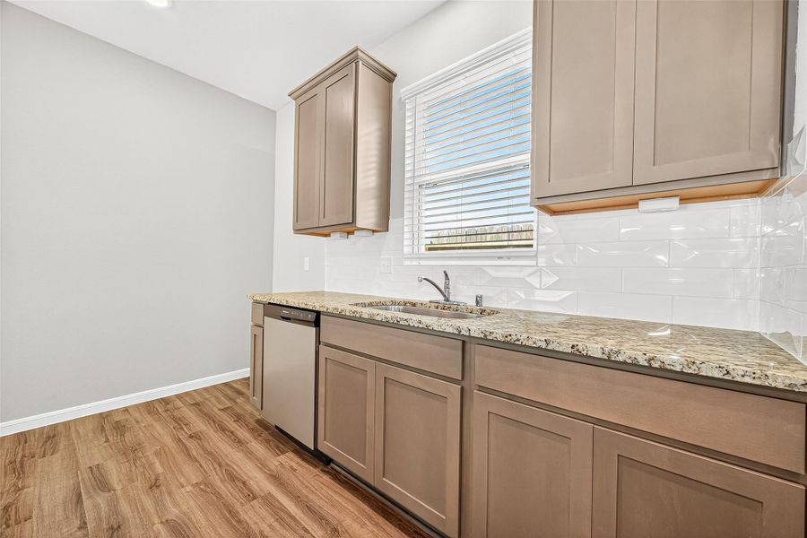 Furnished interior view inside a new home in Sunterra, Katy (Image 7).