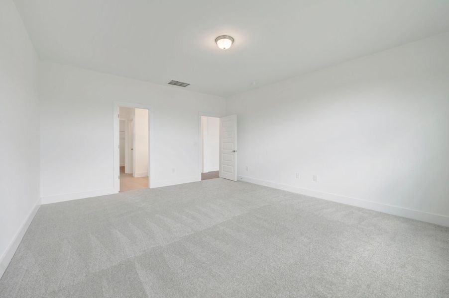 Spacious, unfurnished interior of a new home in McAlister Creek, Clayton (Image 21).