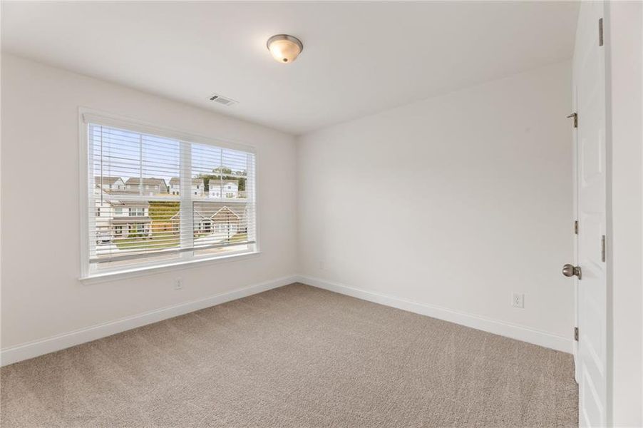 Spacious, unfurnished interior of a new home in Clark Farms, Flowery Branch (Image 16).