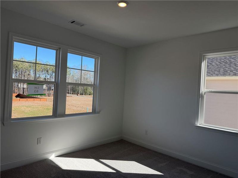 Spacious, unfurnished interior of a new home in Bennett Farm, Loganville (Image 30).
