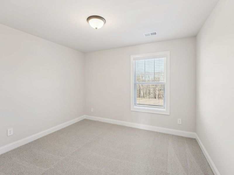 Spacious, unfurnished interior of a new home in Hemingway - Highland Series, Cumming (Image 17).