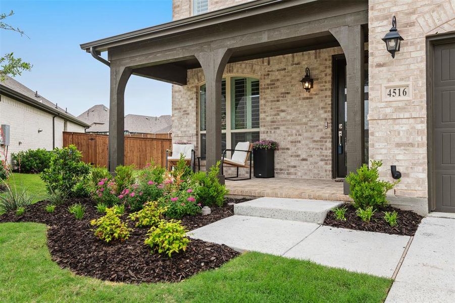 Front exterior of a new home in , Oak Point, TX, highlighting curb appeal (Image 23). Front exterior of a new home in , Oak Point, TX, highlighting curb appeal (Image 23).