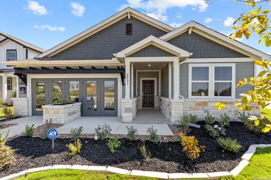 Front exterior of a new home in Hiddenbrooke, Seguin, TX, highlighting curb appeal (Image 1). Front exterior of a new home in Hiddenbrooke, Seguin, TX, highlighting curb appeal (Image 1).
