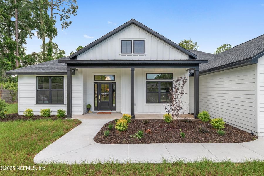 Front exterior of a new home in , Gainesville, FL, highlighting curb appeal (Image 29).