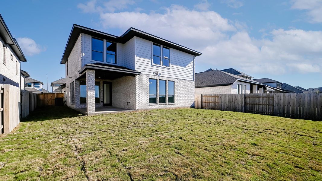 Exterior details and patio area of a home in Crosswinds 50', Kyle (Image 22).