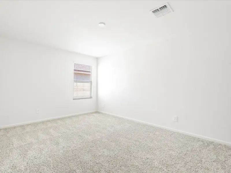 Spacious, unfurnished interior of a new home in Las Patrias at Star Valley Phase III - Signature Series, Tucson (Image 13).