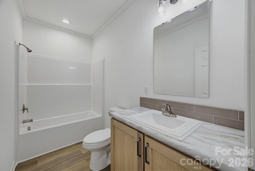 Furnished interior view inside a new home in , Newton (Image 3).
