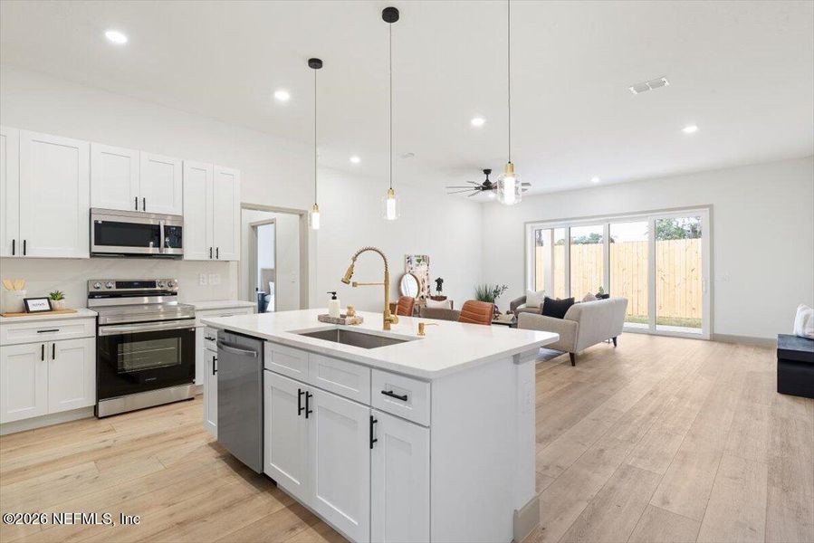 Furnished interior view inside a new home in , Orange Park (Image 9).