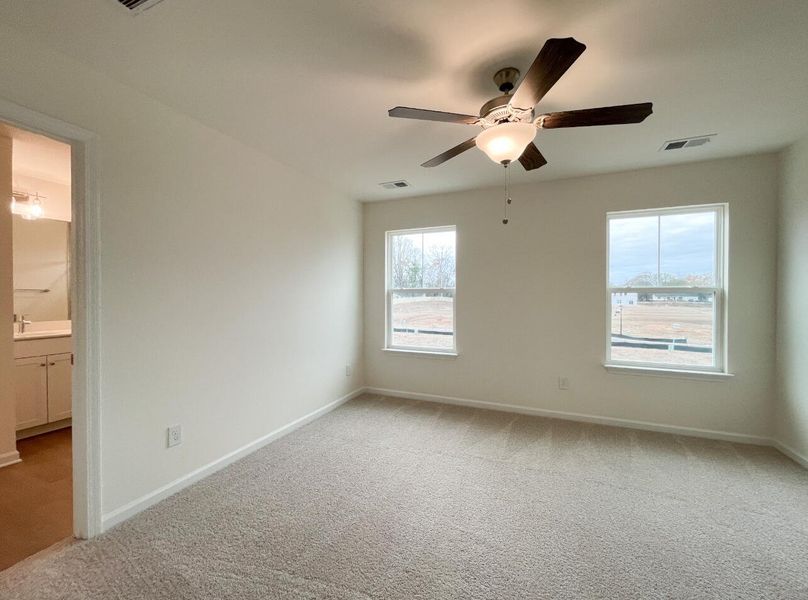 Spacious, unfurnished interior of a new home in Bellevue Townhomes, Greenville (Image 19).