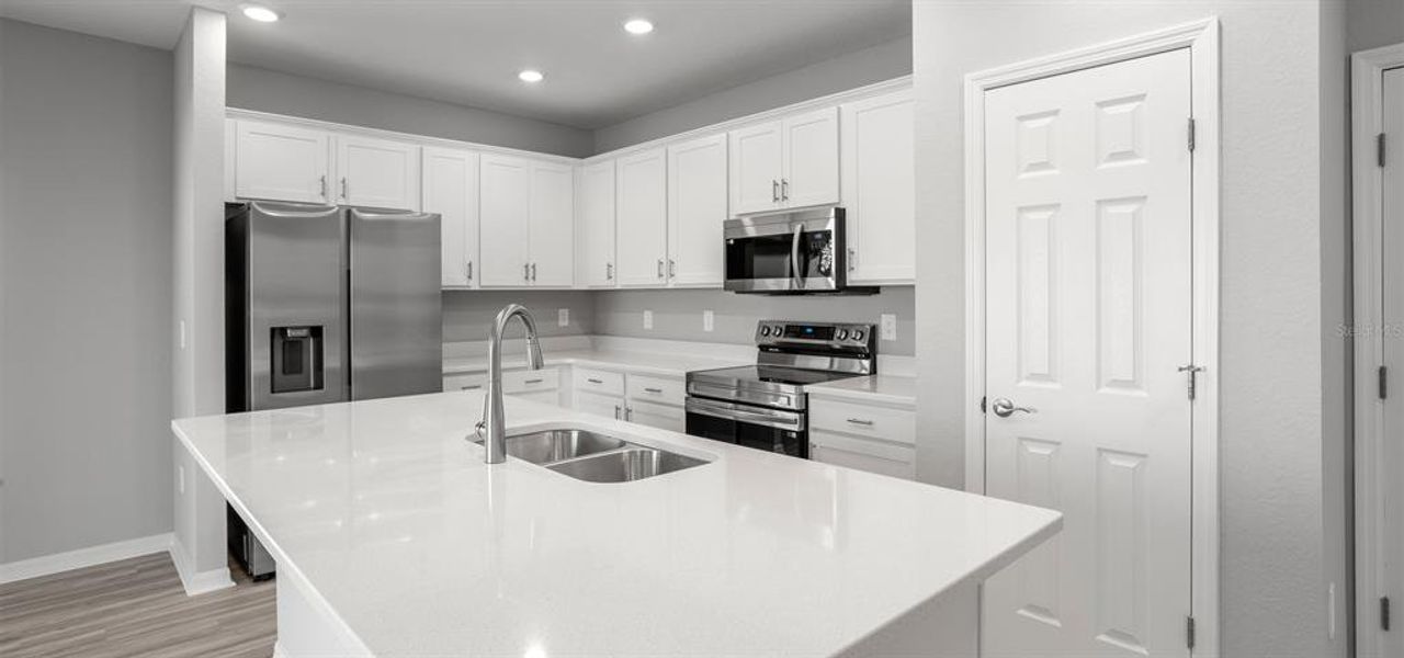 Furnished interior view inside a new home in VillaMar, Winter Haven (Image 4). Furnished interior view inside a new home in VillaMar, Winter Haven (Image 4).