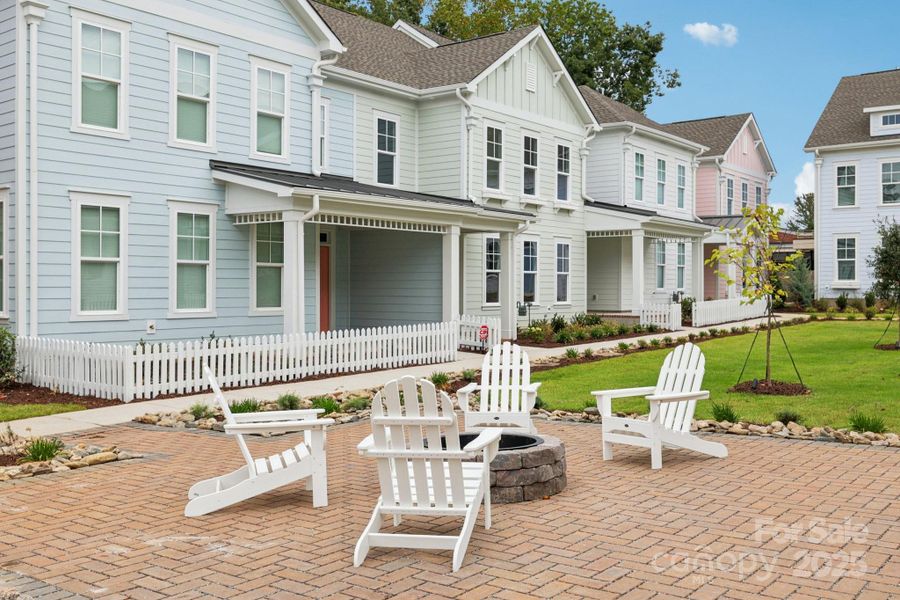 Exterior details and patio area of a home in Walk23, Huntersville (Image 22).
