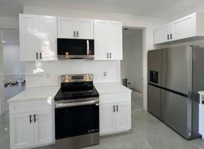 Furnished interior view inside a new home in , Clewiston (Image 16).