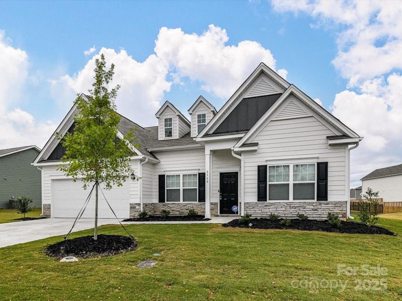 Front exterior of a new home in , Midland, NC, highlighting curb appeal (Image 2).