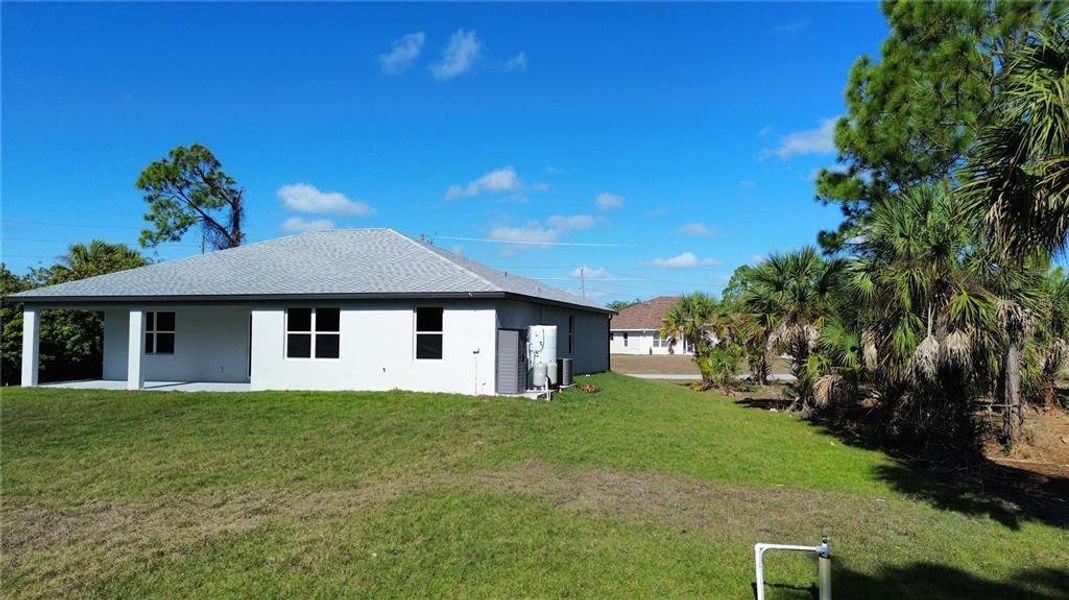 Exterior details and patio area of a home in , North Port (Image 23).