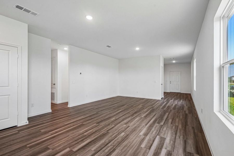 Representative unfurnished interior of a home built from the The Enterprise by Starlight Homes in Windmill Farms, Forney (Image 17).