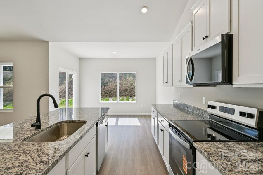 Furnished interior view inside a new home in Willow Estates, Shelby (Image 9).