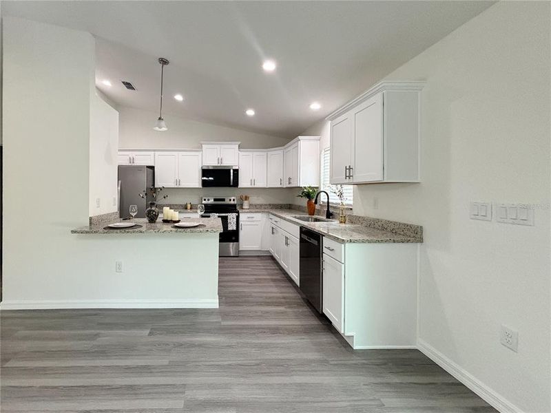 Furnished interior view inside a new home in , Dunnellon (Image 6).