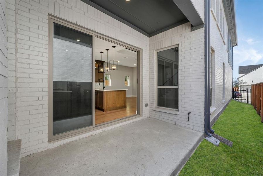 Exterior details and patio area of a home in Fields Villas - Darling Homes, Frisco (Image 22).