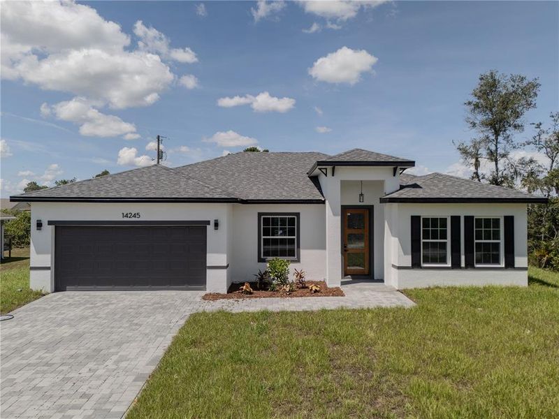 Front exterior of a new home in , Ocala, FL, highlighting curb appeal (Image 24).