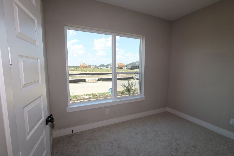 Spacious, unfurnished interior of a new home in Bridgeland Central: Emerald Heights - Landmark Row Collection, Cypress (Image 6).