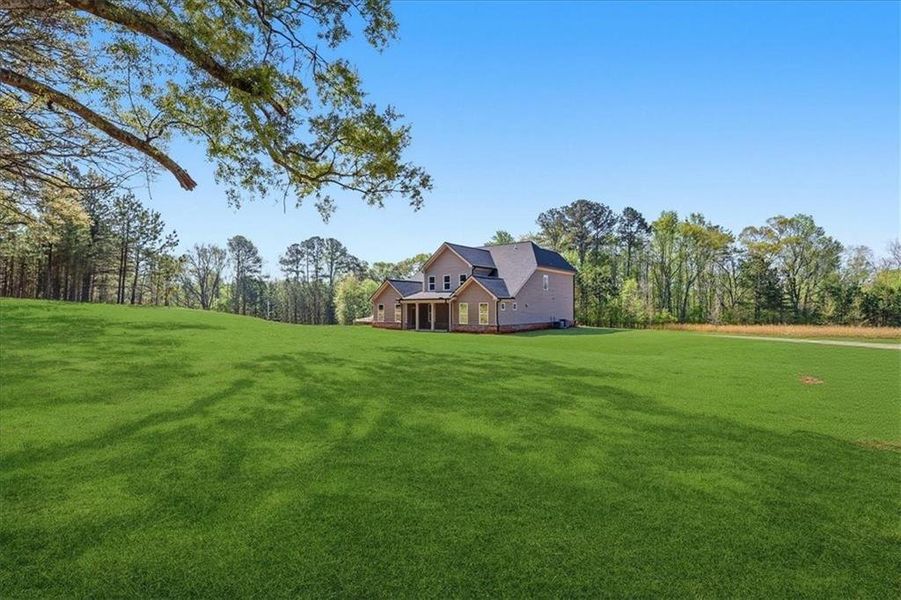 Exterior details and patio area of a home in , Hoschton (Image 35).