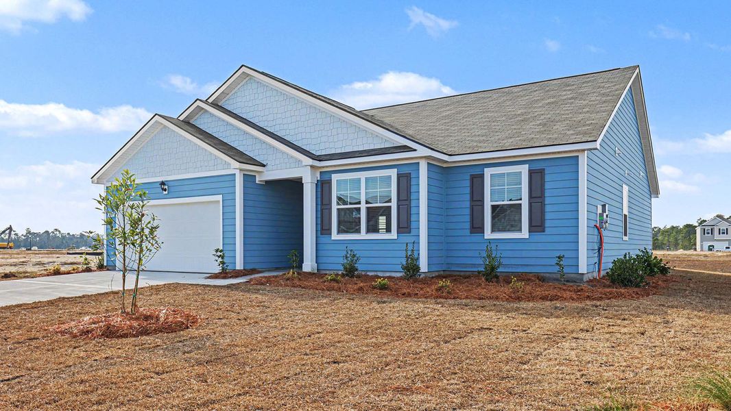 Front exterior of a new home in Auberon Woods, Conway, SC, highlighting curb appeal (Image 13).