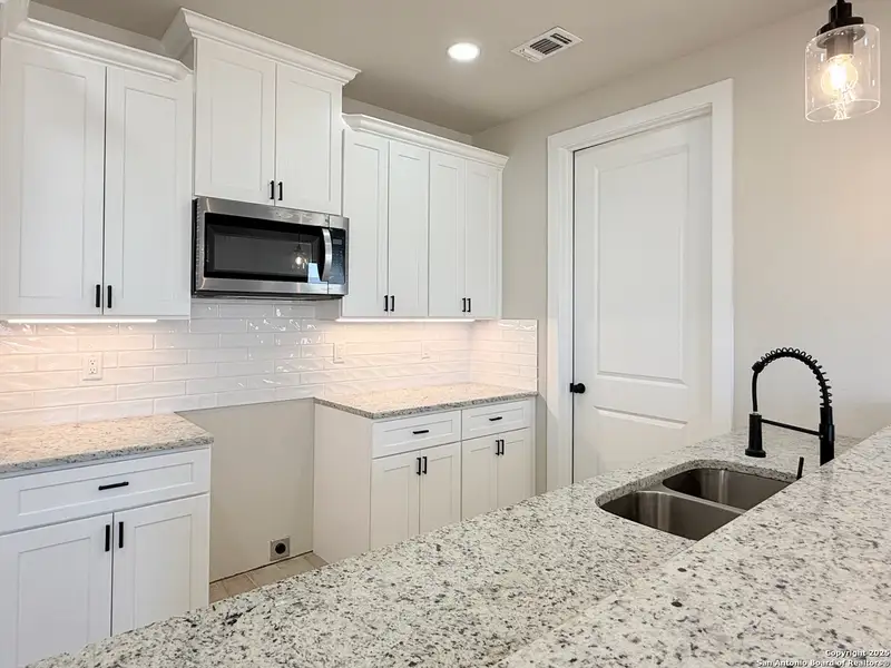 Furnished interior view inside a new home in , La Vernia (Image 11).