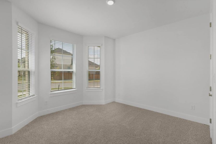 Representative unfurnished interior of a home built from the Mariah by Chesmar Homes in University Heights, McKinney (Image 21).