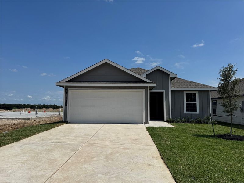 Front exterior of a new home in Wilkins Valley, Brenham, TX, highlighting curb appeal (Image 2).