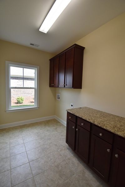 Representative furnished interior of a home built from the Cosmopolitan by Keystone Homes NC in Weybridge, Burlington (Image 16).