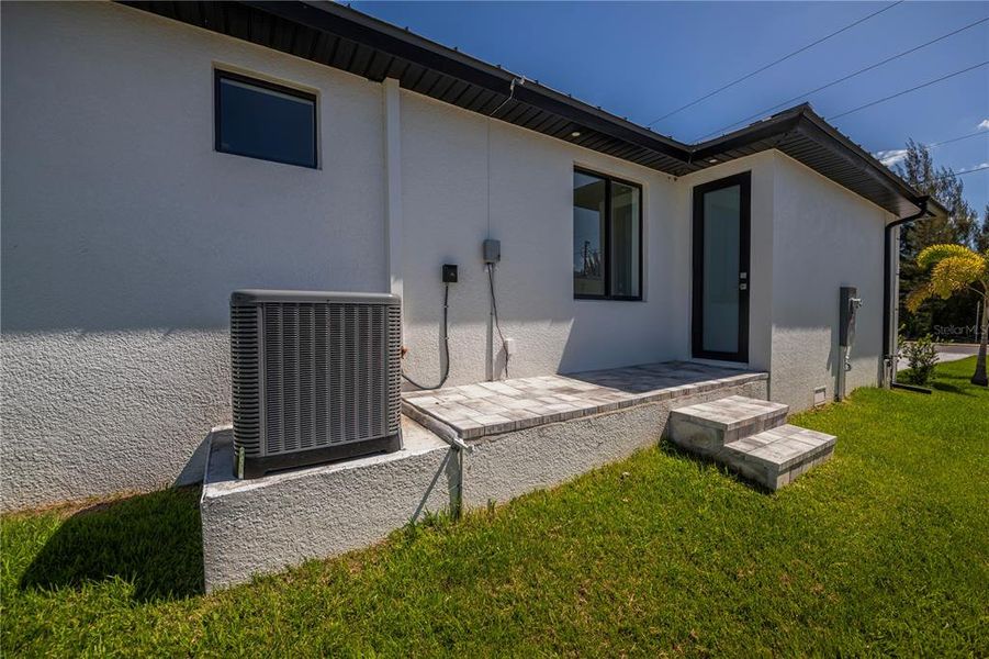Exterior details and patio area of a home in , Port Charlotte (Image 36).