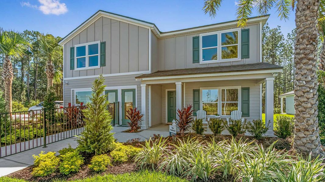 Front exterior of a new home in Copes Landing, Jacksonville, FL, highlighting curb appeal (Image 1). Front exterior of a new home in Copes Landing, Jacksonville, FL, highlighting curb appeal (Image 1).