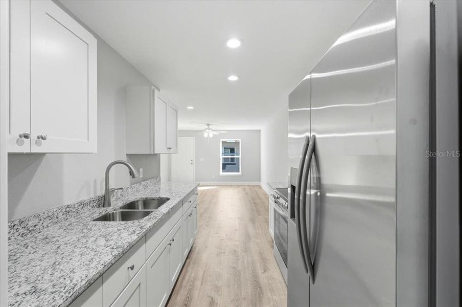 Furnished interior view inside a new home in , Winter Haven (Image 6). Furnished interior view inside a new home in , Winter Haven (Image 6).