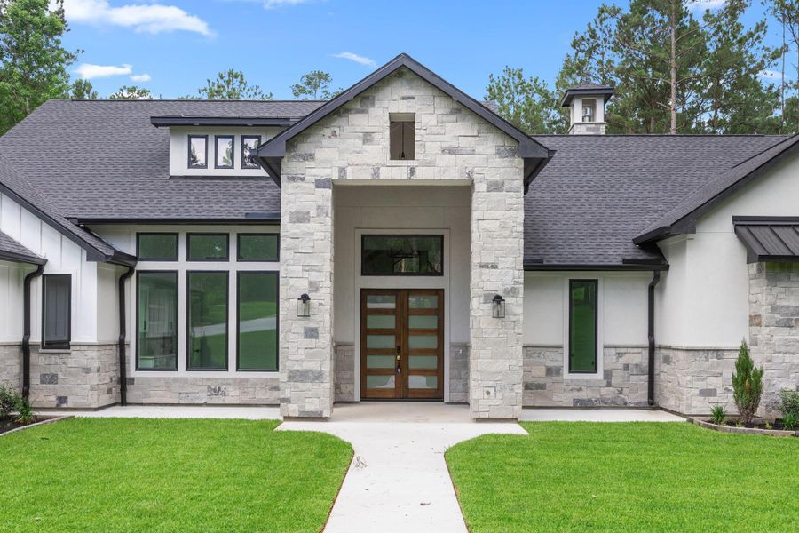Front exterior of a new home in , Montgomery, TX, highlighting curb appeal (Image 29).