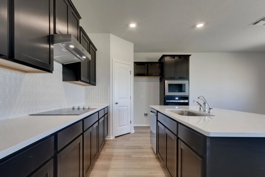 Representative furnished interior of a home built from the Dunlap by Ashton Woods in Meadows at Hennersby Hollow 40's, San Antonio (Image 6).