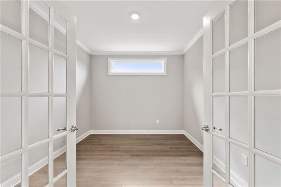 Spacious, unfurnished interior of a new home in The Courtyards at Bailey Farm, Dacula (Image 9).