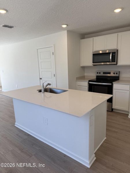 Furnished interior view inside a new home in Trout River, Jacksonville (Image 12).