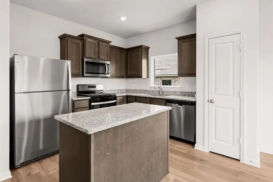 Furnished interior view inside a new home in Patriot Estates, Venus (Image 5).