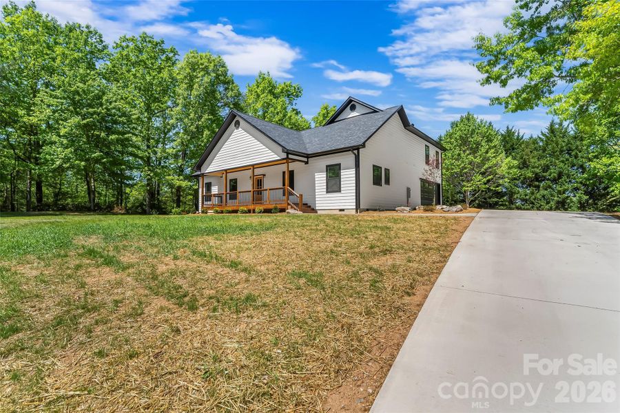 Front exterior of a new home in , Marion, NC, highlighting curb appeal (Image 22).