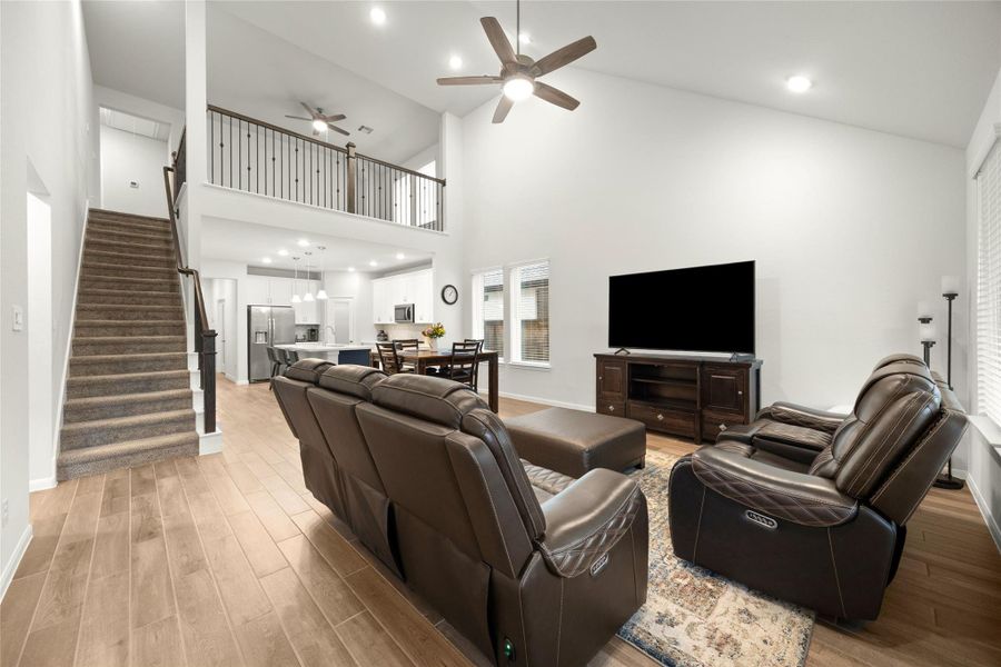 The spacious living room serves as the heart of the home with an open and airy design. The spacious living room serves as the heart of the home with an open and airy design.