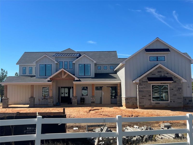 Front exterior of a new home in , Pearland, TX, highlighting curb appeal (Image 14).