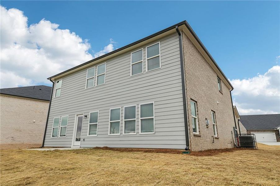 Exterior details and patio area of a home in Creekside at Oxford Park, Fairburn (Image 3). Exterior details and patio area of a home in Creekside at Oxford Park, Fairburn (Image 3).