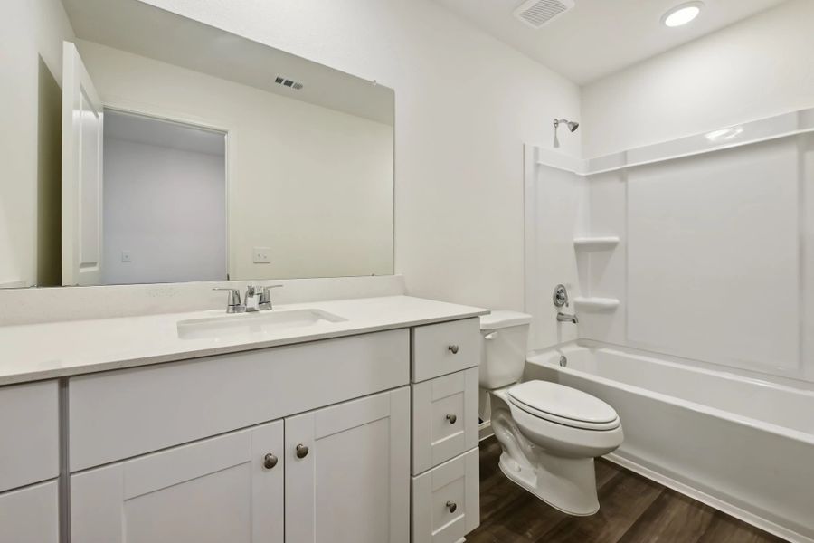 Representative furnished interior of a home built from the Magellan by Starlight Homes in Crossing at Givhans, Ridgeville (Image 14).