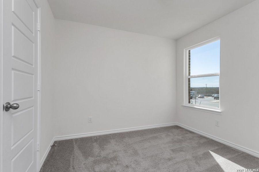 Spacious, unfurnished interior of a new home in Hidden Bluffs at TRP, San Antonio (Image 8).