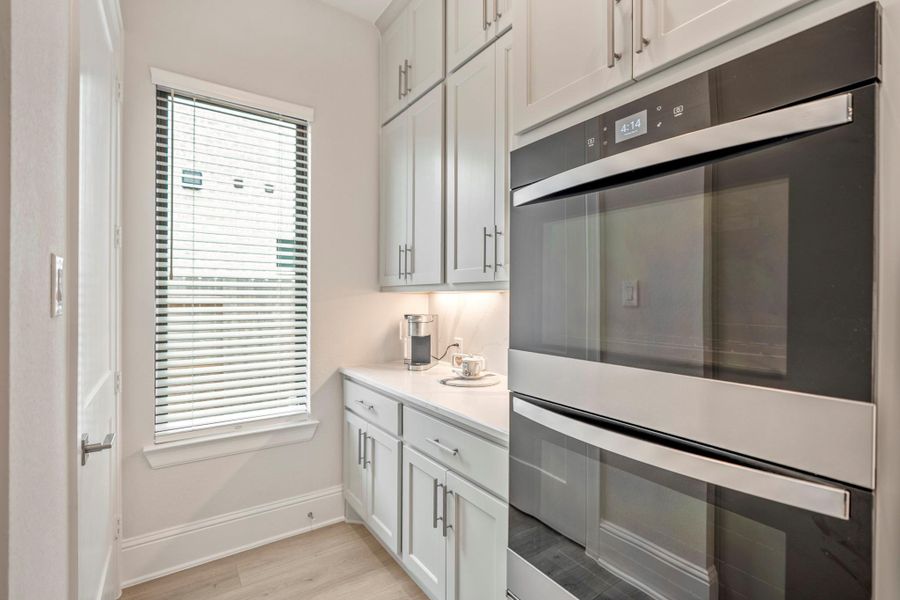 Furnished interior view inside a new home in The Highlands - 65', Porter (Image 6).