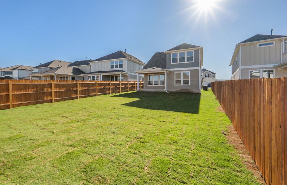 Exterior details and patio area of a home in Santa Rita Ranch, Liberty Hill (Image 23).